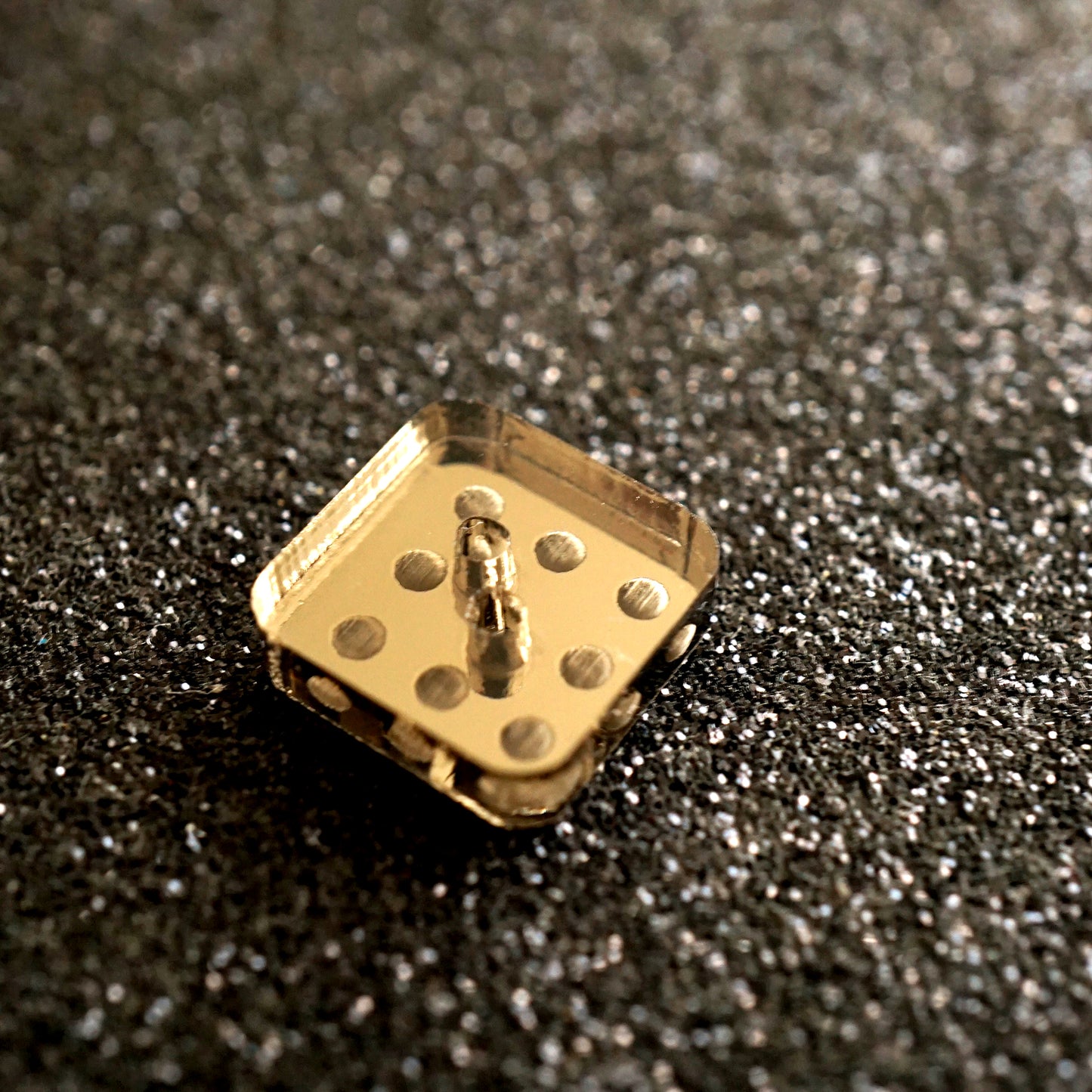 The Domino Button