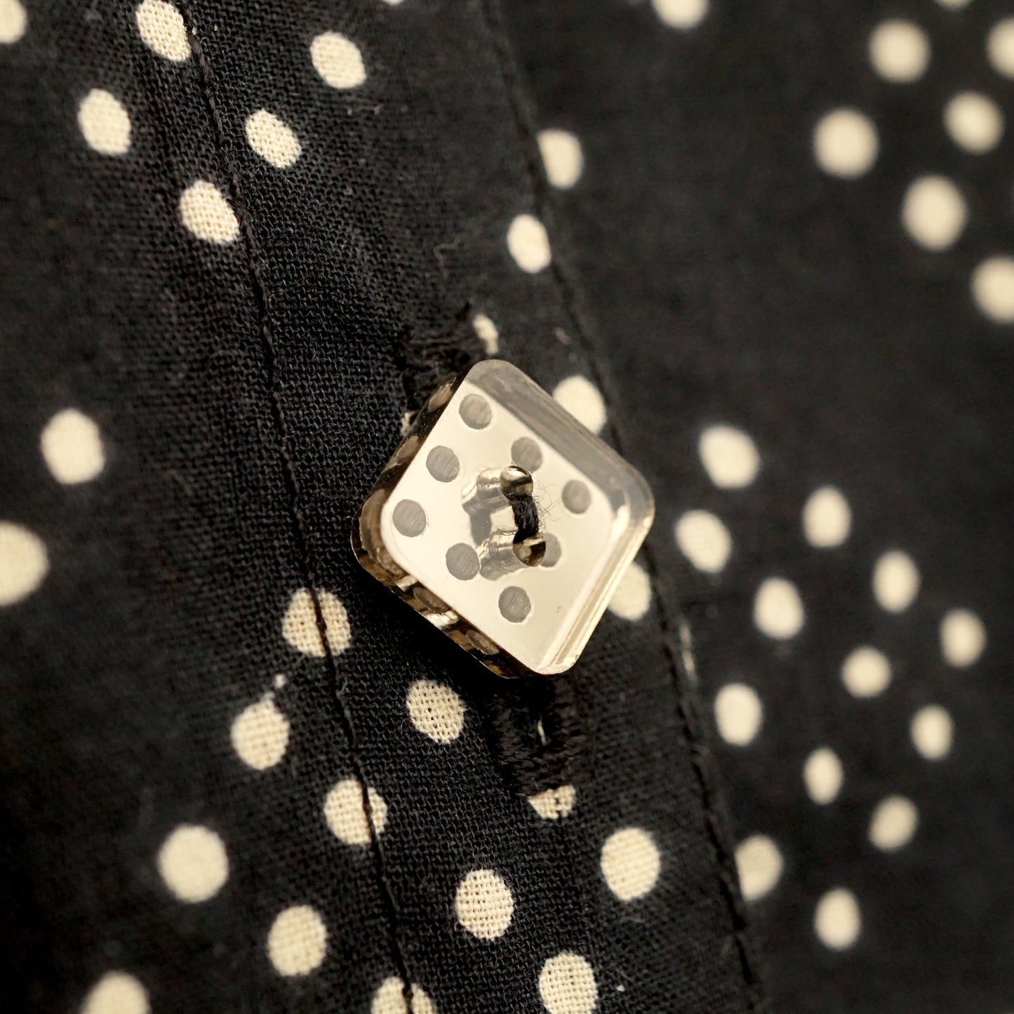 The Domino Button