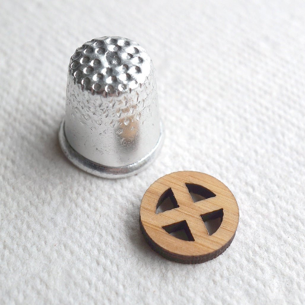 The Sun Cross Button