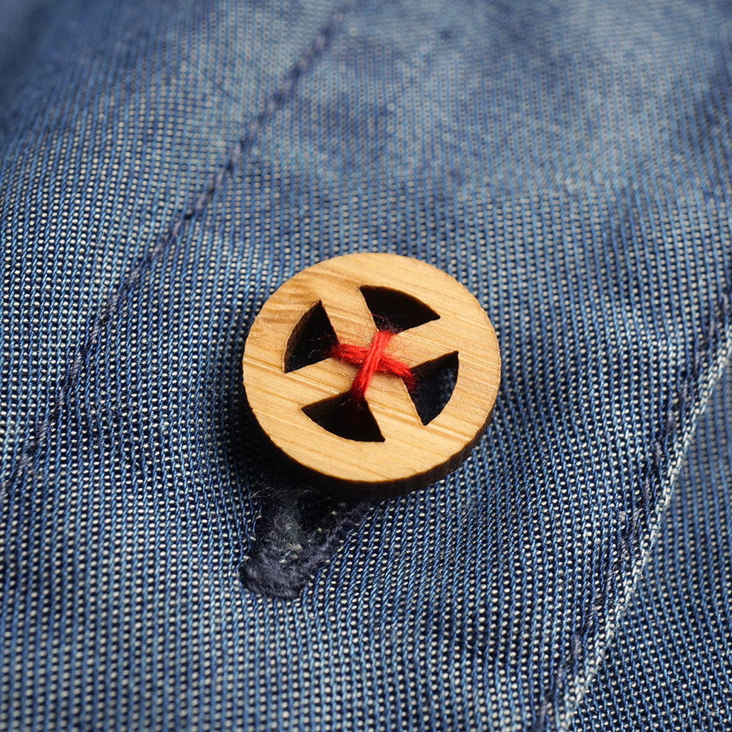 The Sun Cross Button